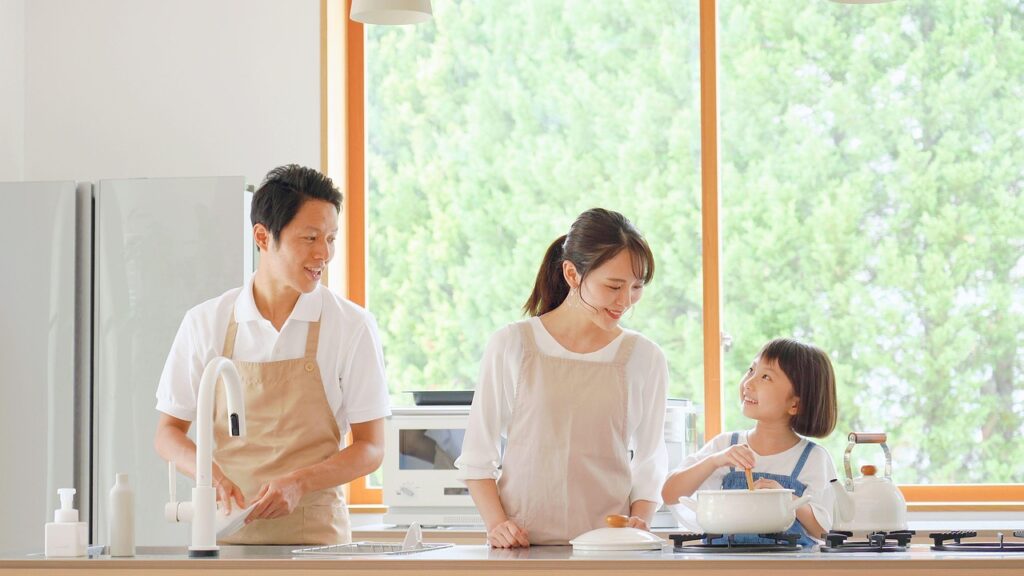 a family working in the kitchen