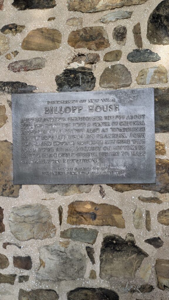 The bronze plaque on the Conference House marking the peace conference of 11 September 1776