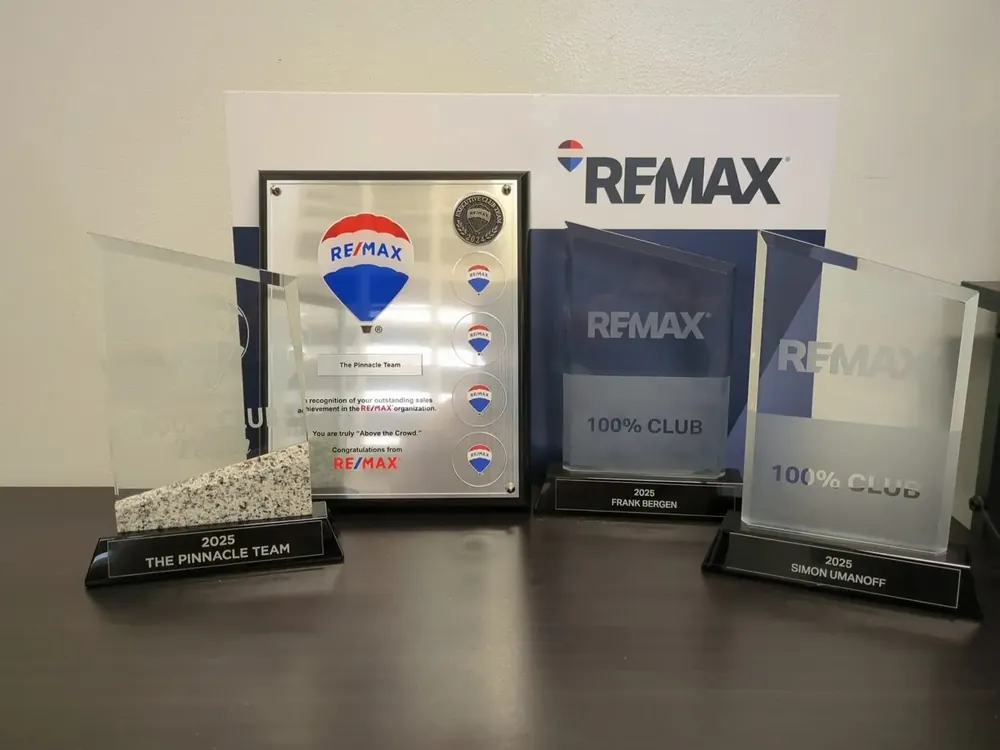 RE/MAX award plaques at the Willowbrook Road office