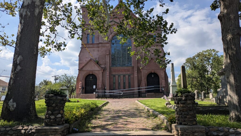 A brick church and its churchyard in Tottenville, Staten Island